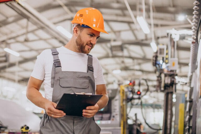 a man taking inspection - The Vital Role of Millwrighting Services in Industrial Maintenance