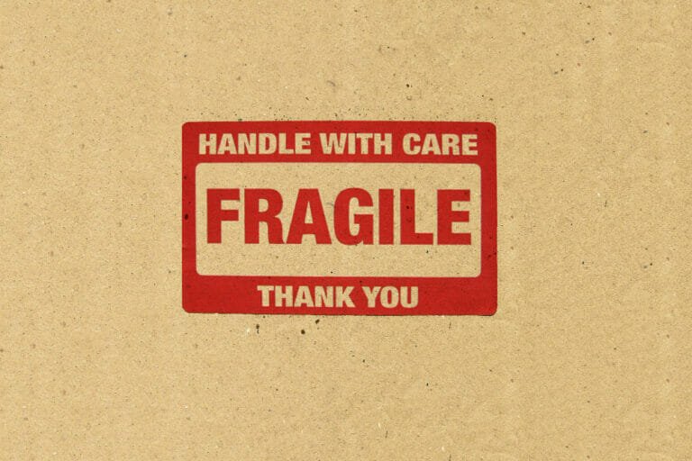 fragile industrial equipment sign - handling and securing fragile components during industrial rigging moves