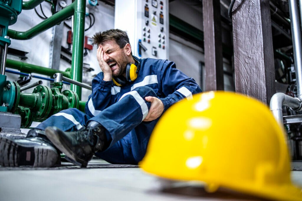 Injured factory worker - How Industrial Rigging Inspections Prevent Accidents and Downtime