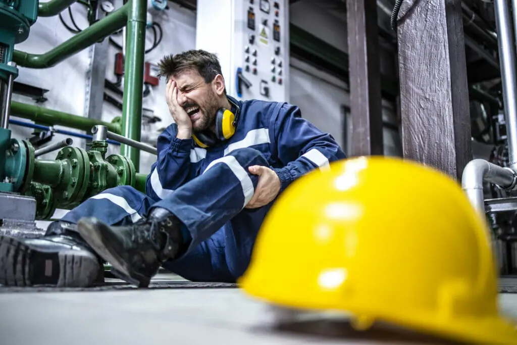 Injured factory worker - How Industrial Rigging Inspections Prevent Accidents and Downtime