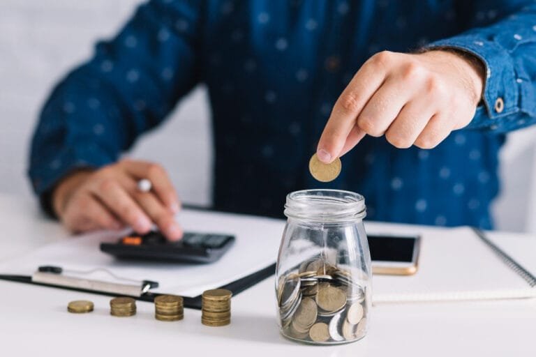 man calculating different ways to save on industrial storage cost savings