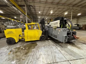 How Versa-Lift Trucks Achieve Precise Load Placement in Tight Spaces