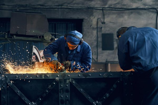 two industrial workers - Crafting Excellence in Industrial Fabrication